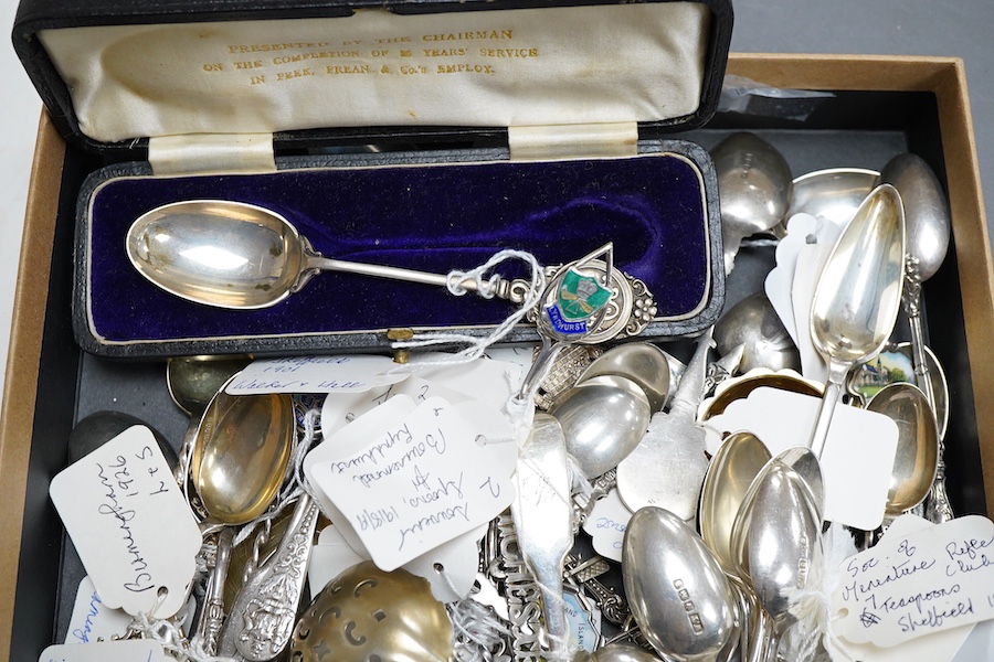 A large collection of assorted mainly 20th century silver and white metal commemorative and club spoons, some enamelled, including a set of six ' Society Miniature Rifle Clubs' teaspoons, by Walter Trickett, Sheffield, 1